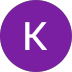 White letter K centered on a purple circular background.