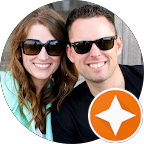 White letter K centered on a purple circular background.