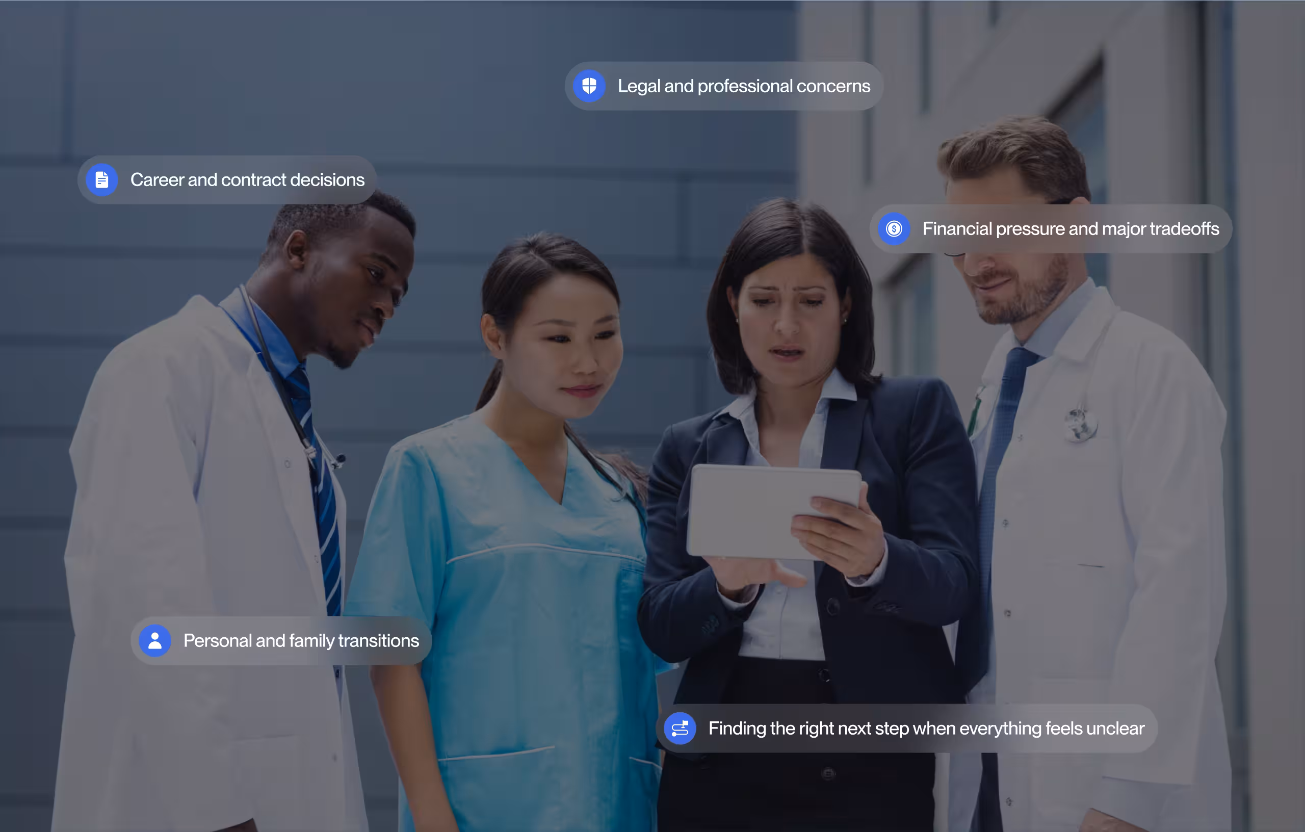 Two doctors, a nurse, and a woman in business attire looking at a tablet, discussing healthcare topics.