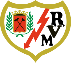 Rayo Vallecano football club crest with red lightning bolt, black letters RVM, and a red shield with crossed black batons surrounded by green laurel branches.