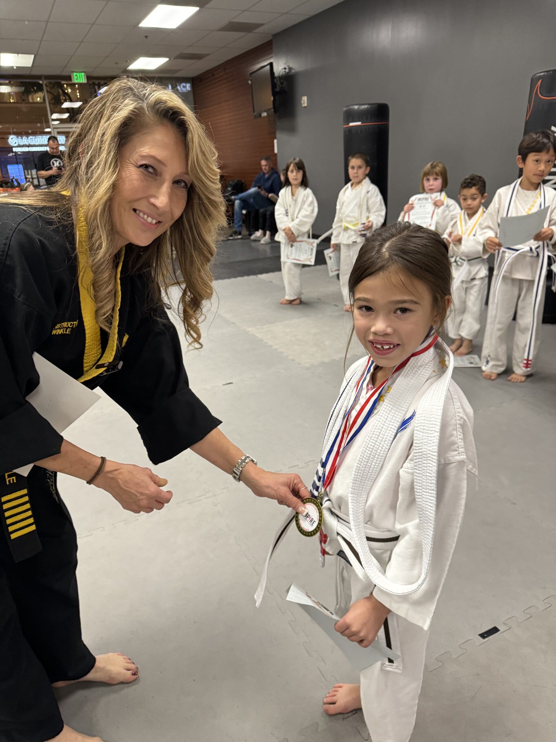 Martial arts helps kids learn self-defense training, understa nd phyical techniques, improve their own safety, interpret body language, respond appropriately, and develop self-control.
