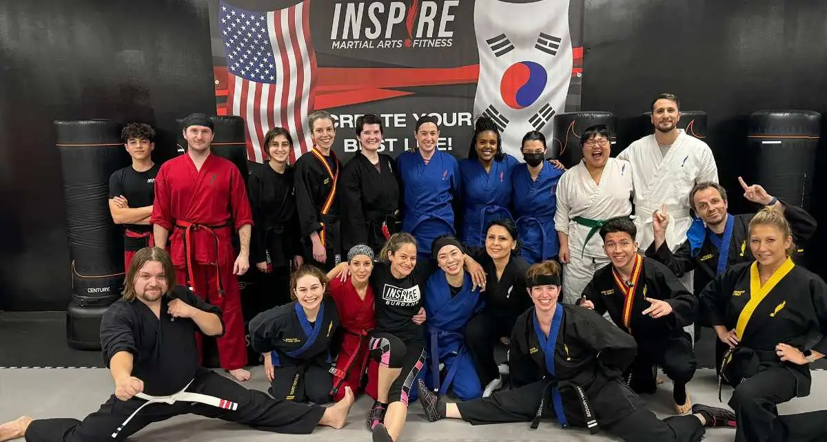Community group photo after completing adult self defense classes at a local academy.