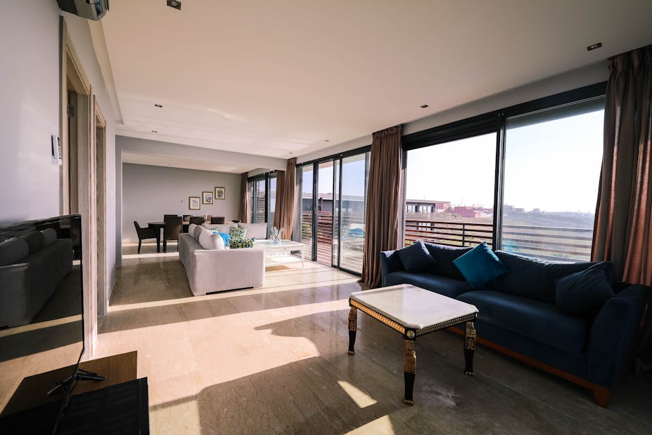 Modern luxury apartment living room with floor-to-ceiling windows