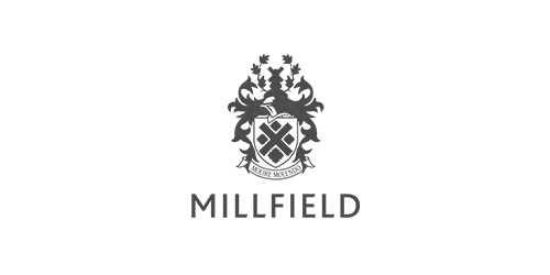 Millfield school logo with the slogan 'The whole person' in grey text.