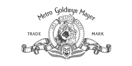 Metro Goldwyn Mayer logo featuring a roaring lion encircled by a film reel with the words TRADE MARK.