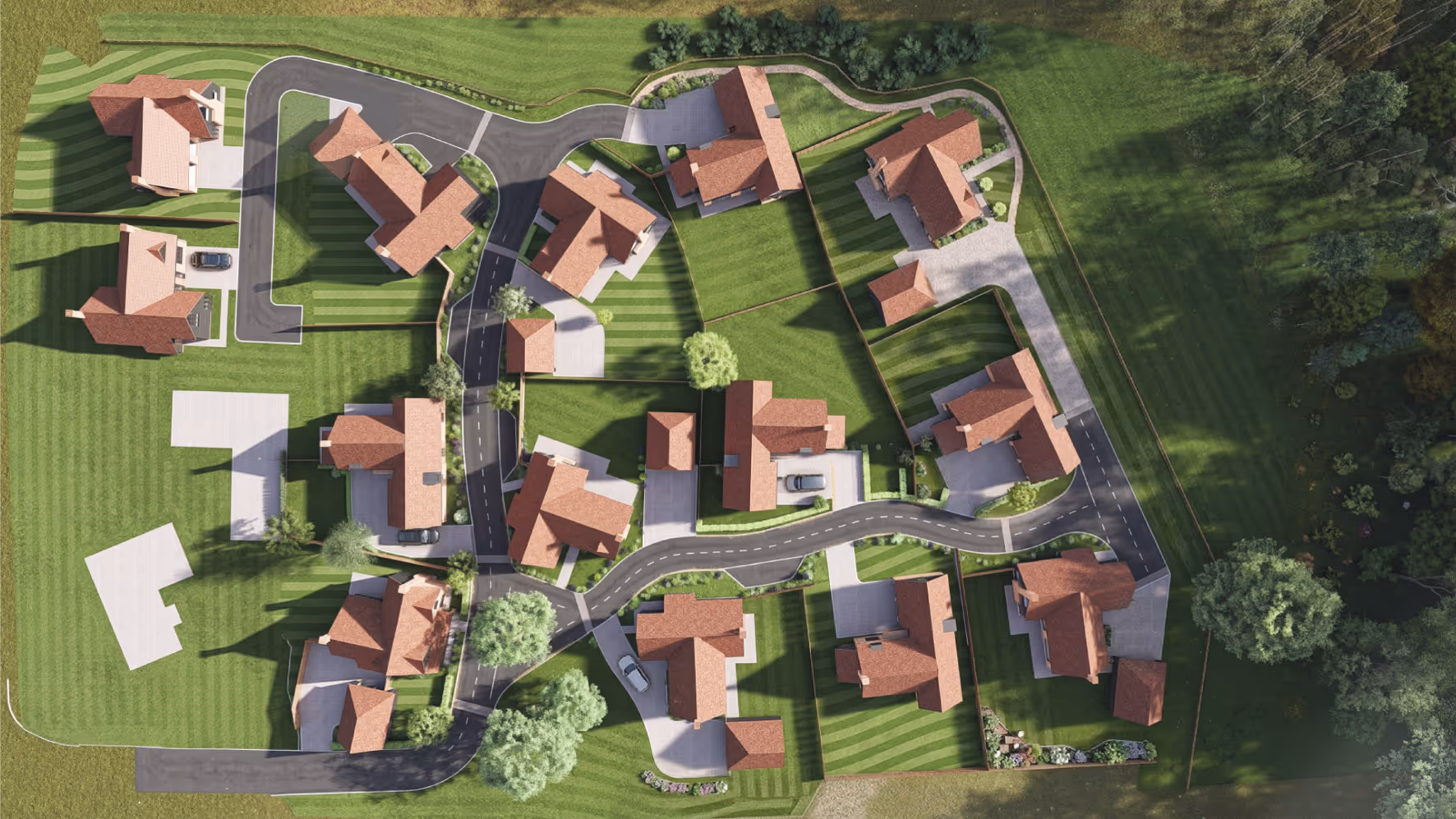 Aerial view of a residential neighborhood with multiple houses, green lawns, trees, and paved roads.