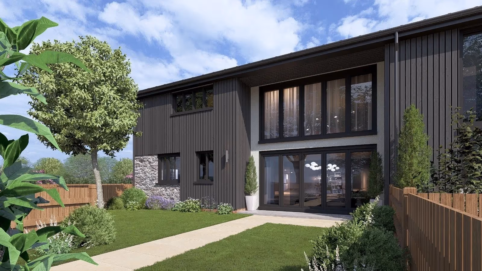 Modern two-story house with dark vertical siding, large windows, stone accent, and a landscaped garden with green lawn and wooden fence.