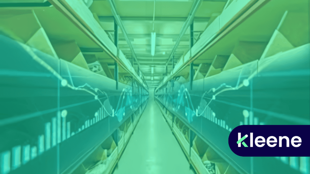 Modern industrial warehouse with green-tinted shelving and lighting, Kleene logo visible