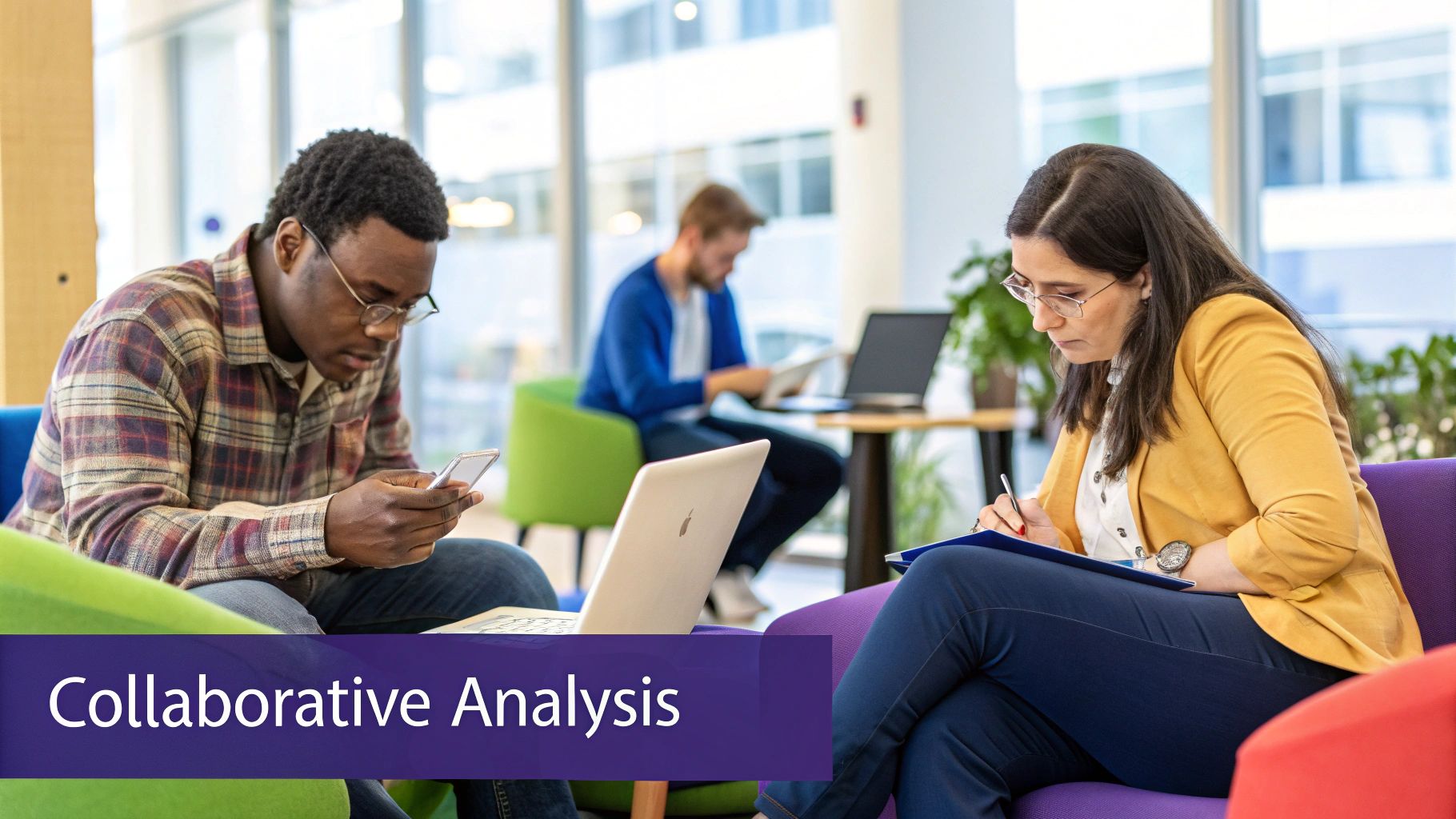 Team members collaborating in a modern office with laptops and mobile devices for data analysis