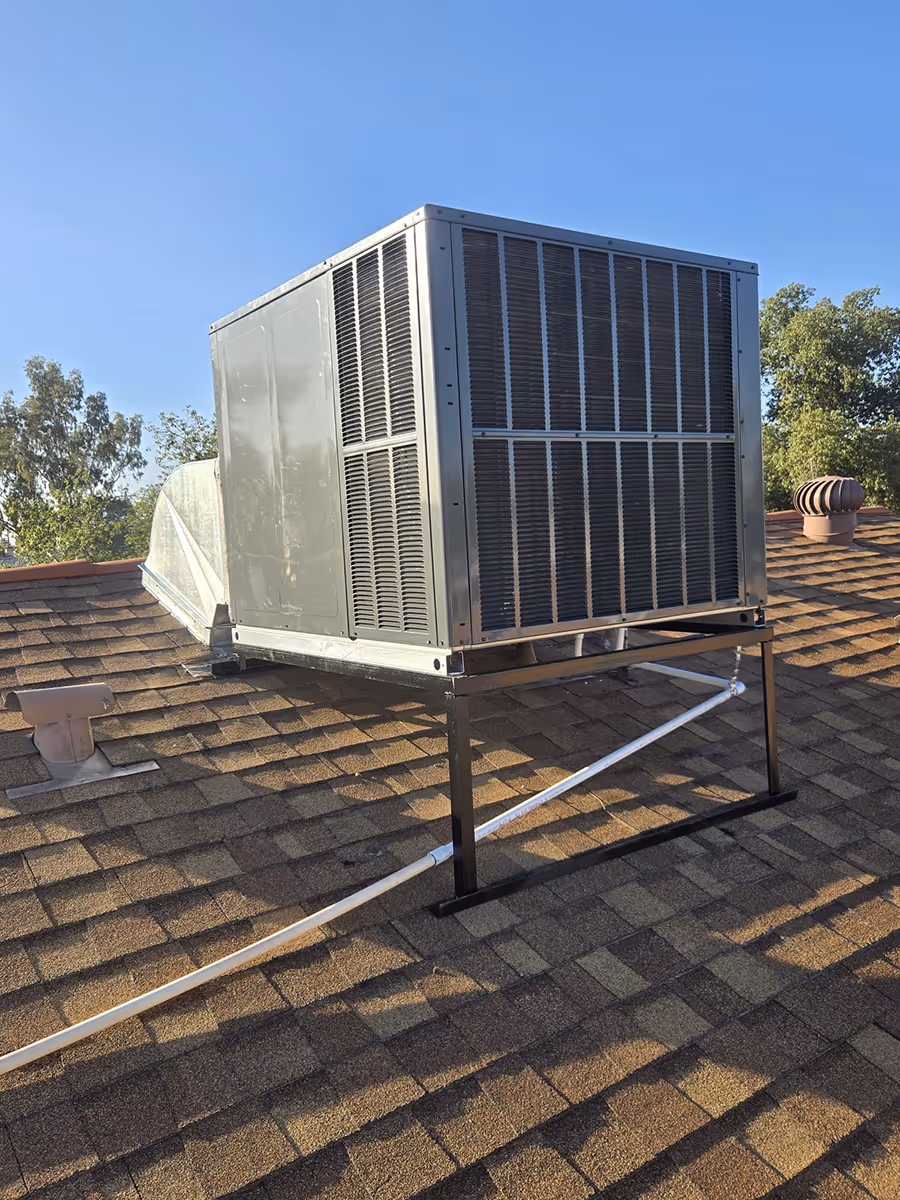 HVAC contractor providing emergency repairs on a cooling system in San Tan Valley.