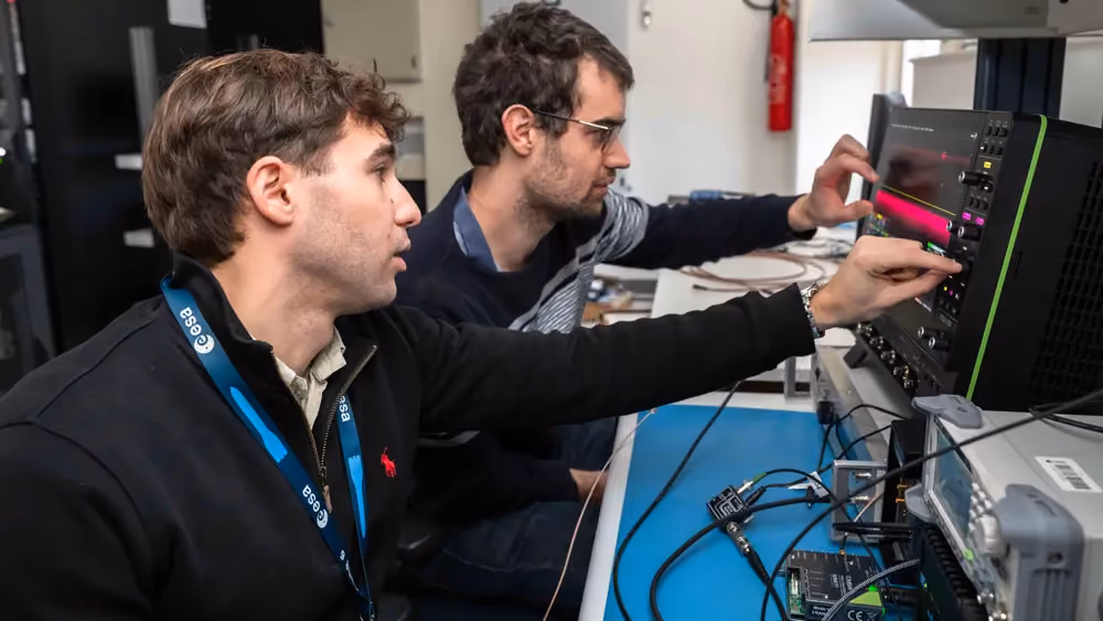 ESA engineers operating test equipment in the Hardware Security Laboratory built by eShard