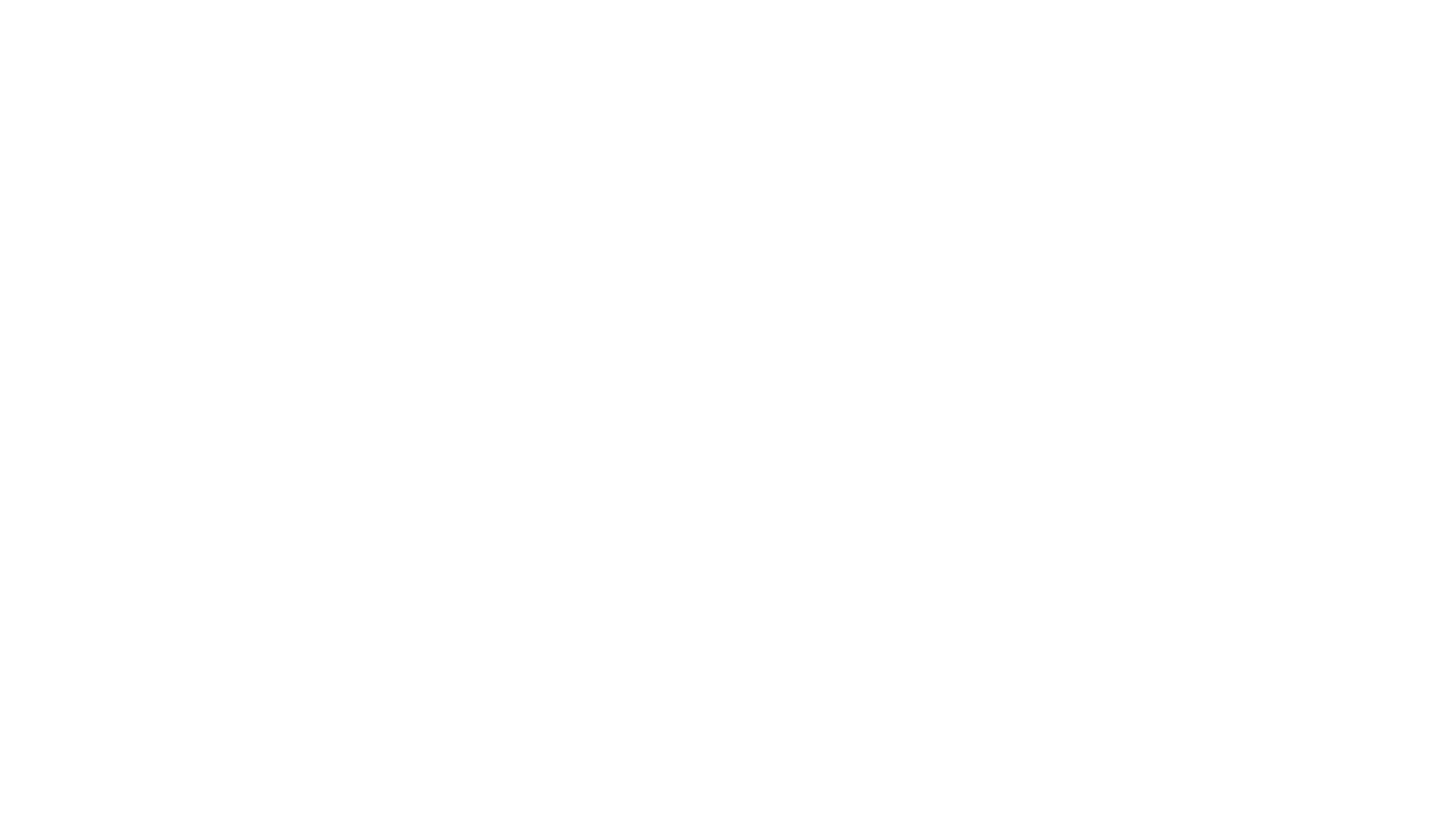 Close-up of a smooth, light-colored surface with soft shadows.