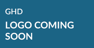 Text reading 'GHD LOGO COMING SOON' on a blue background.