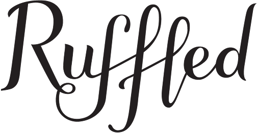 Ruffled blog wordmark in elegant, flowing black script font.