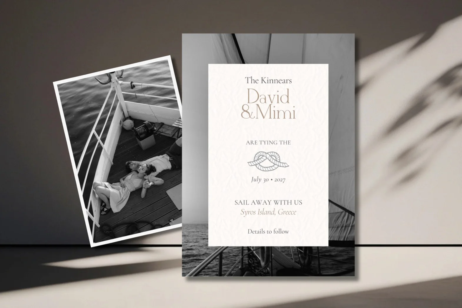 Black and white photo of couple on a boat next to a wedding invitation on Syros Island, Greece.
