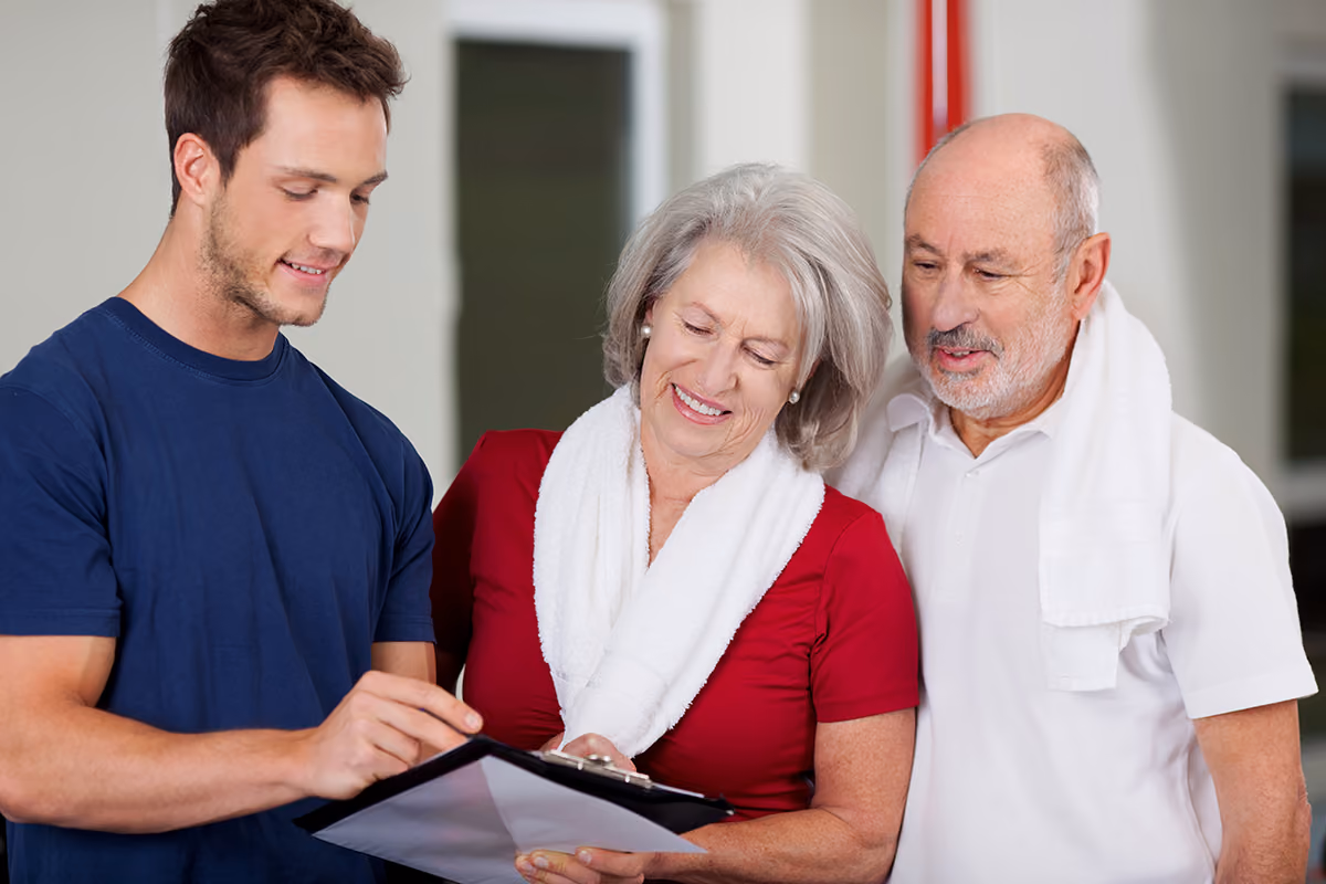 a specialist explain to elderly couple