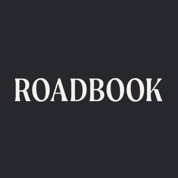 The word ROADBOOK in white serif font on a dark gray background.