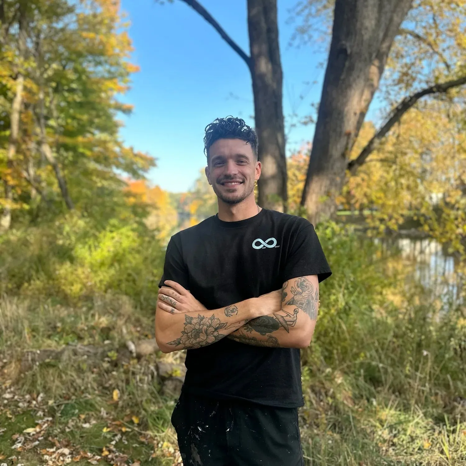 Worthy Finishes founder Gabe Woodworth and painting crew in Greater Lansing