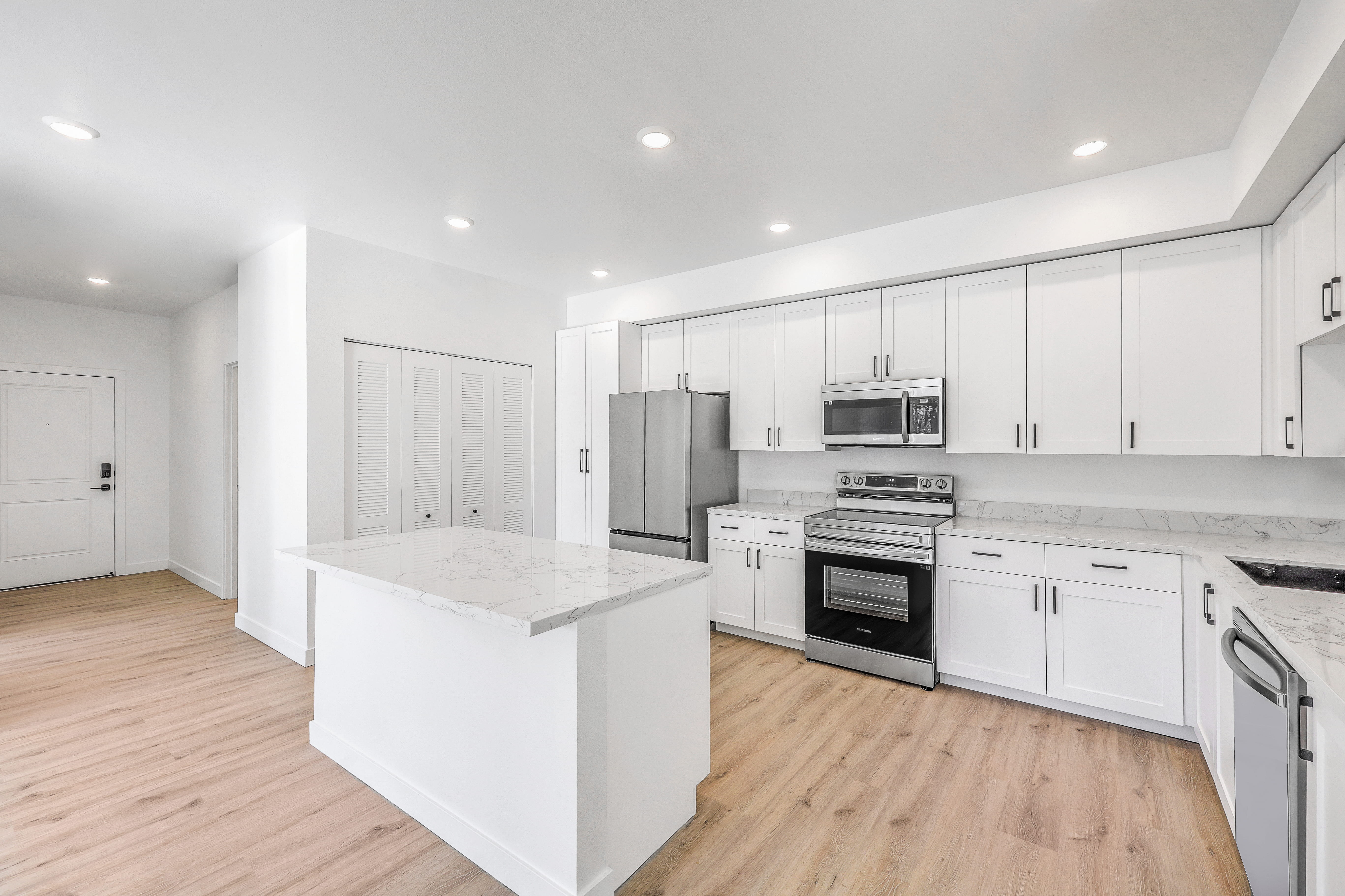 kitchen with white cabinets