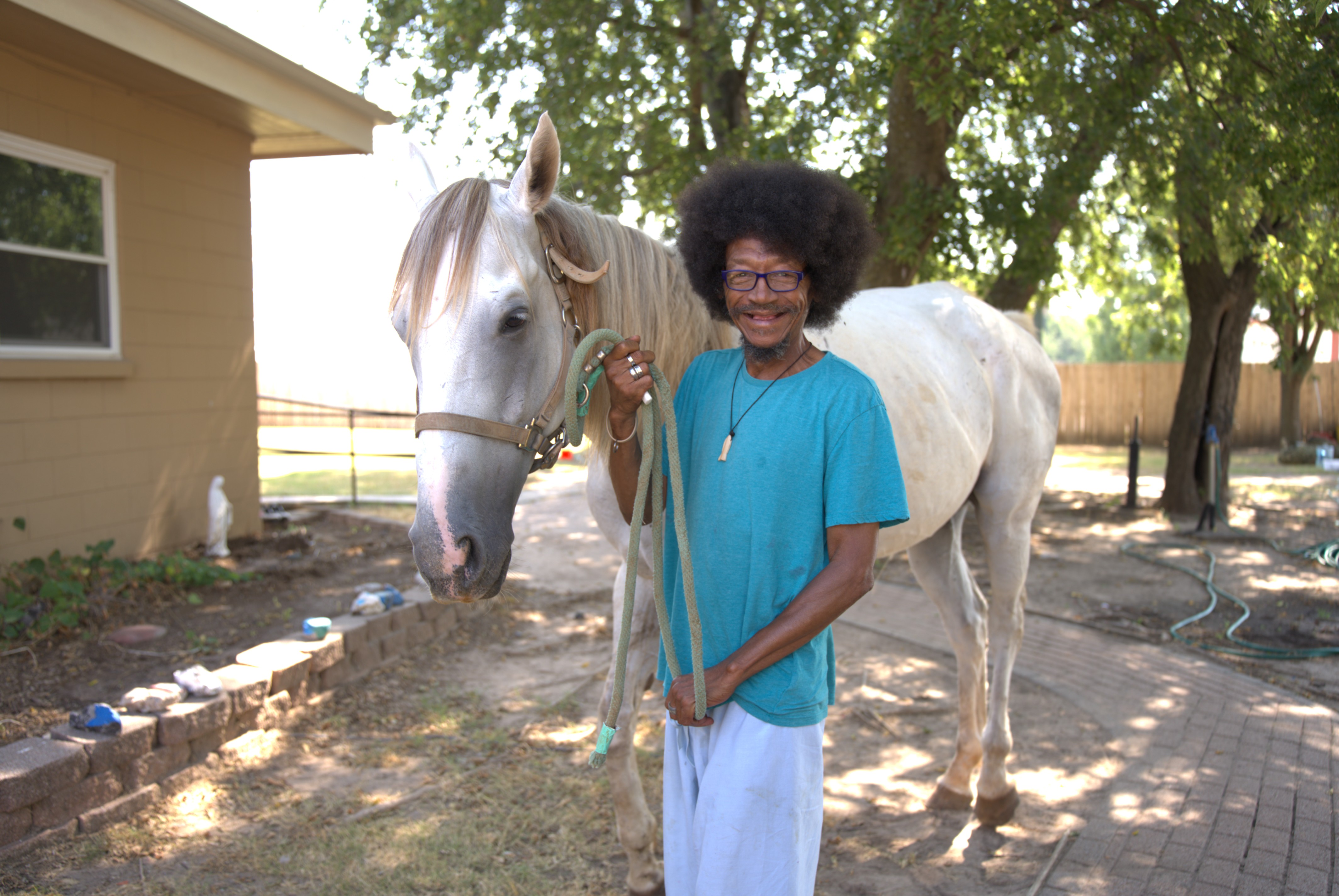 Lady dancing with a man in a wheelchair