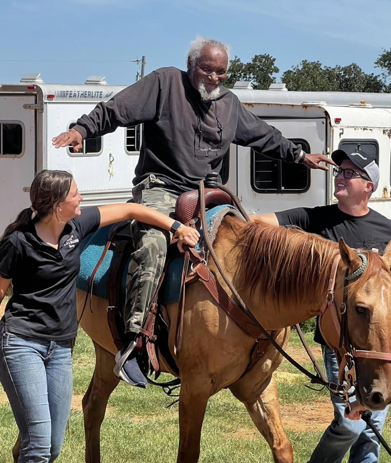 Man smiling at baseball game
