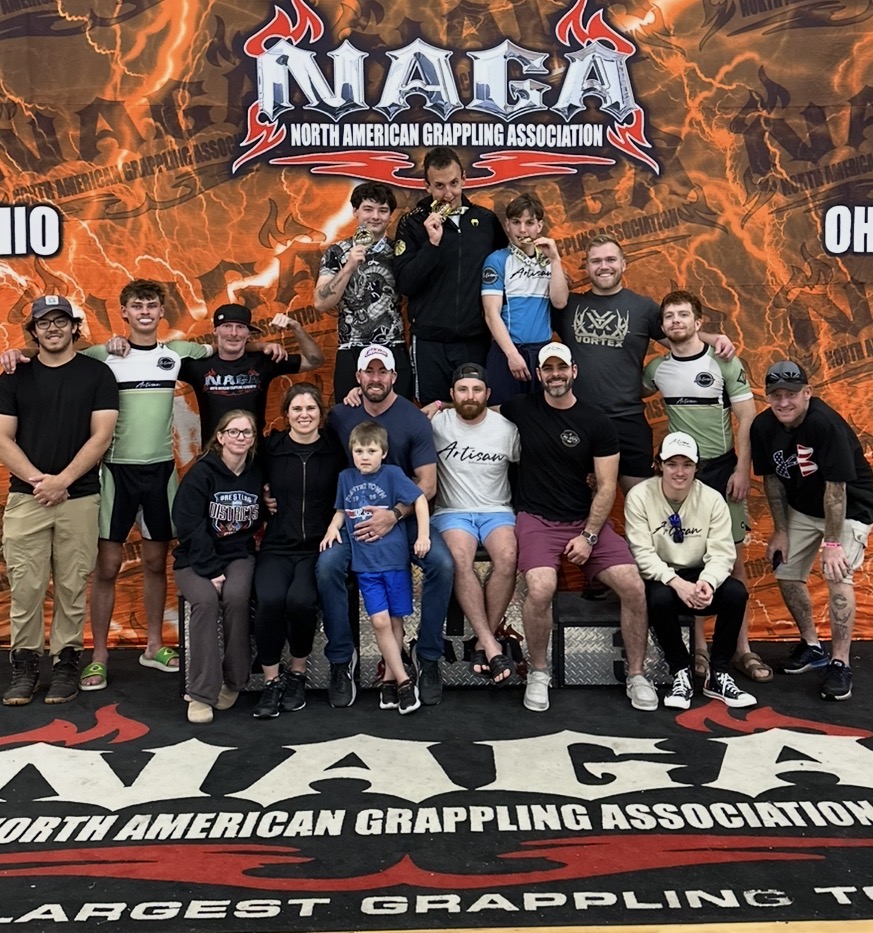 Artisan Submission Grappling students training together on the mats