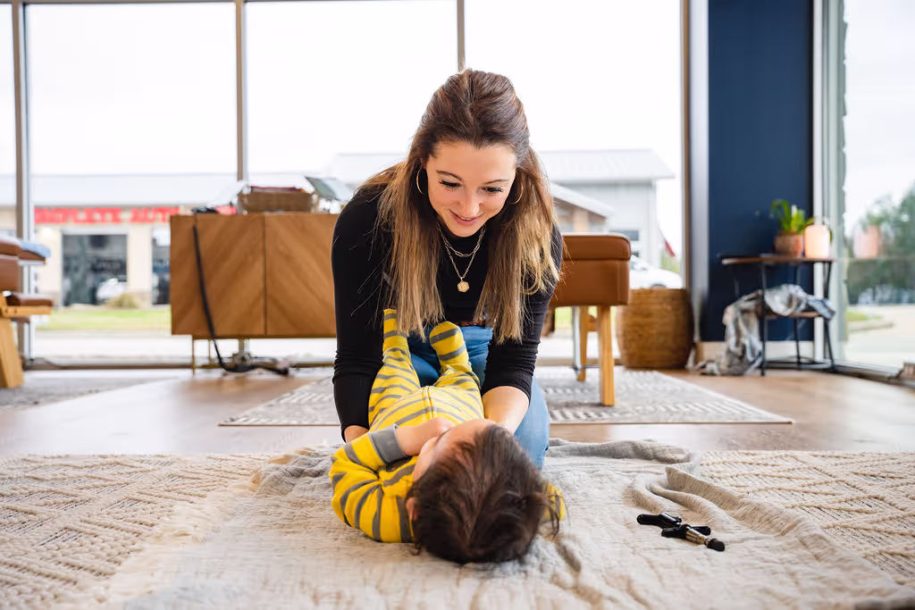 Infant receiving safe, gentle chiropractic care from certified pediatric chiropractor