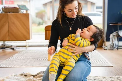 A chiropractor at Ignite Chiropractic gently adjusting a young child to support motor development, coordination, and nervous system function naturally.