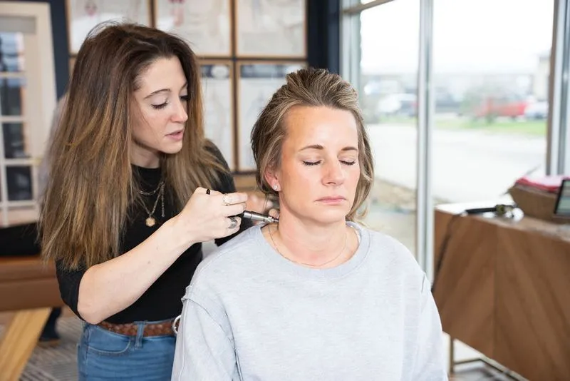 A chiropractor at Ignite Chiropractic gently adjusting a patient’s neck to support balance, nervous system function, and vertigo relief naturally.