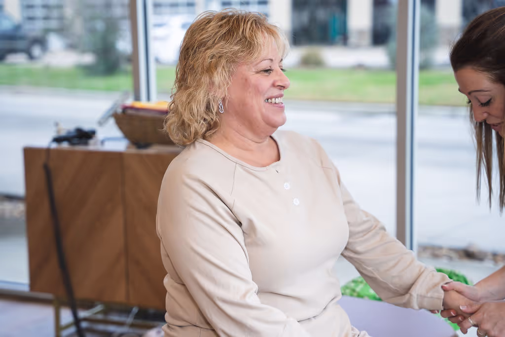 A chiropractor at Ignite Chiropractic in Cypress, TX gently adjusting a patient to support elbow pain relief, improve mobility, and enhance overall nervous system function naturally.