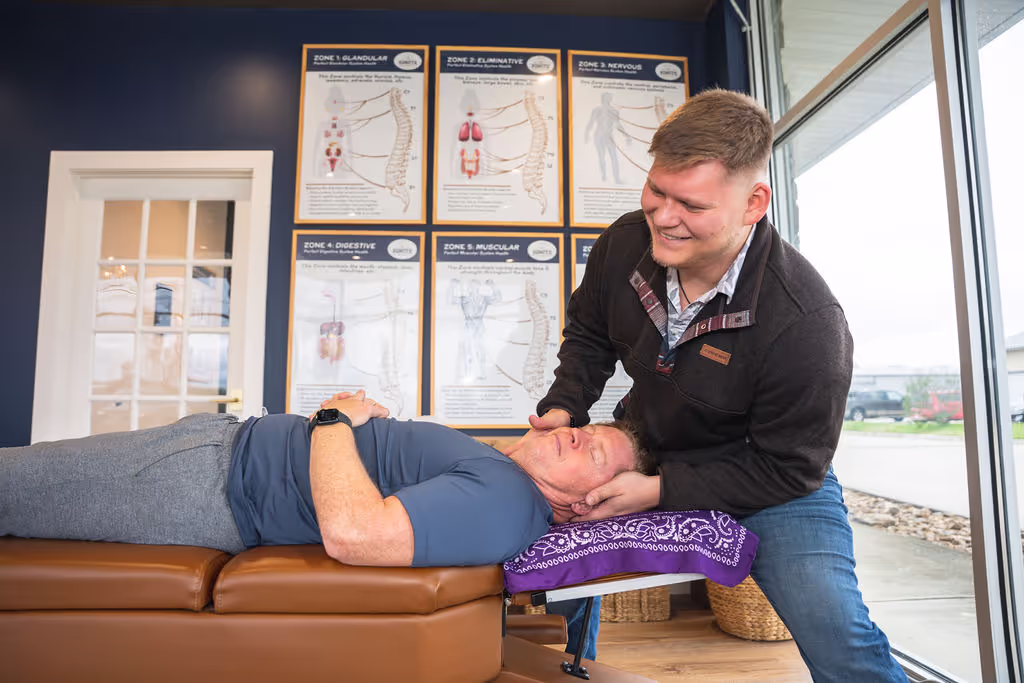 A neurologically focused chiropractor at Ignite Chiropractic near Katy, TX helping a patient's body heal naturally through a chiropractic adjustment.