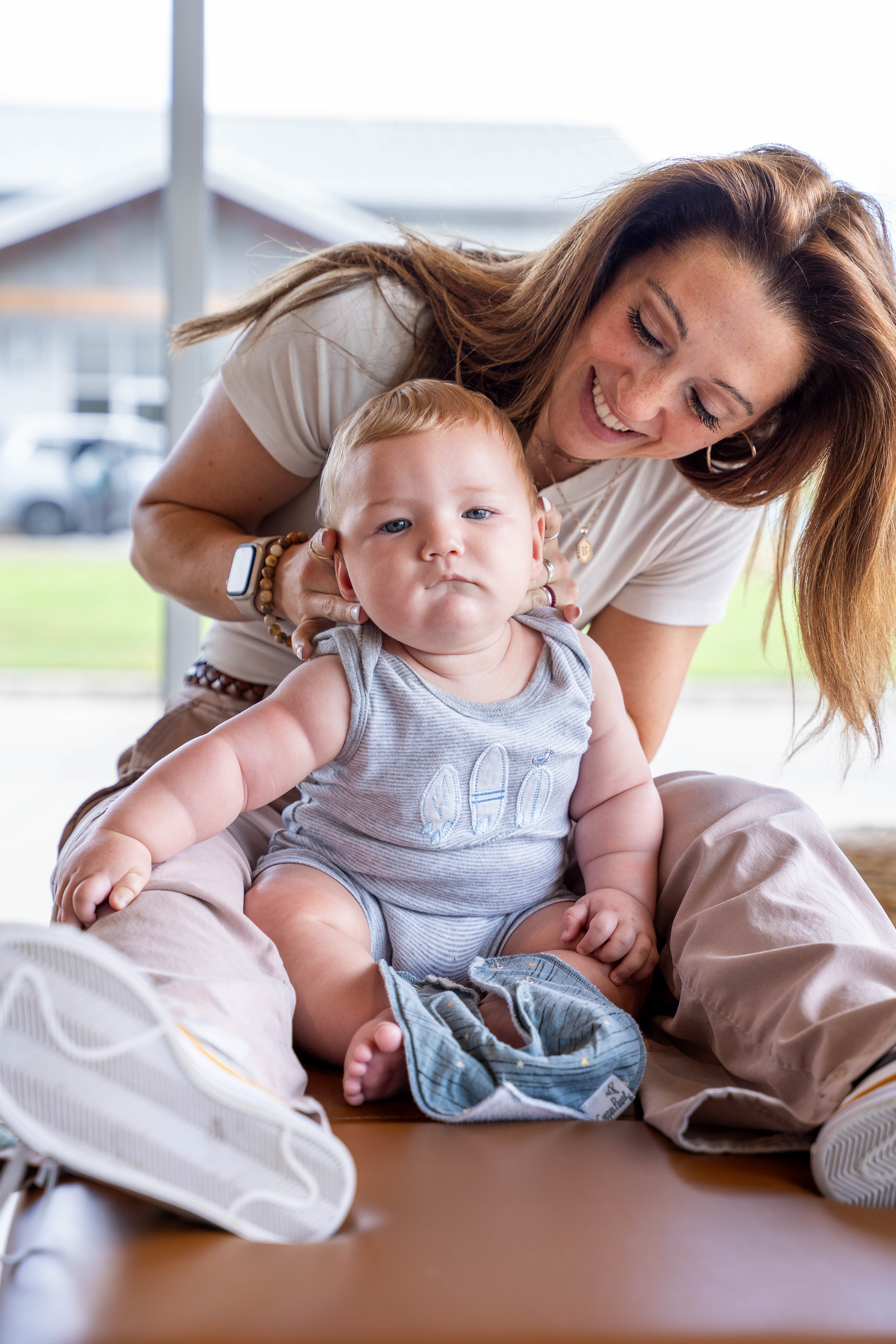 A chiropractor works on a baby to balance their nervous system near Northlake, TX.