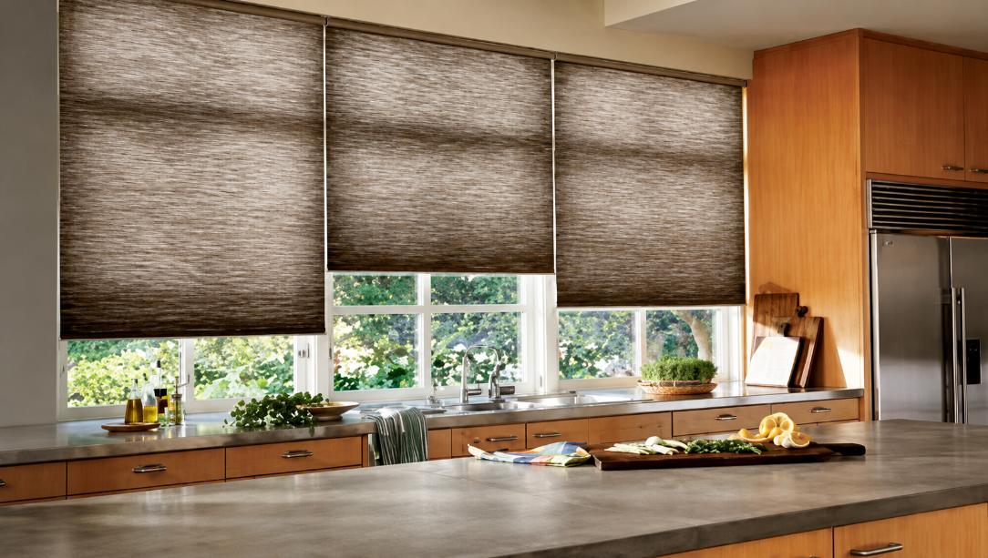 Modern kitchen with woven roller shades acting as a stylish Truckee, CA window shades.