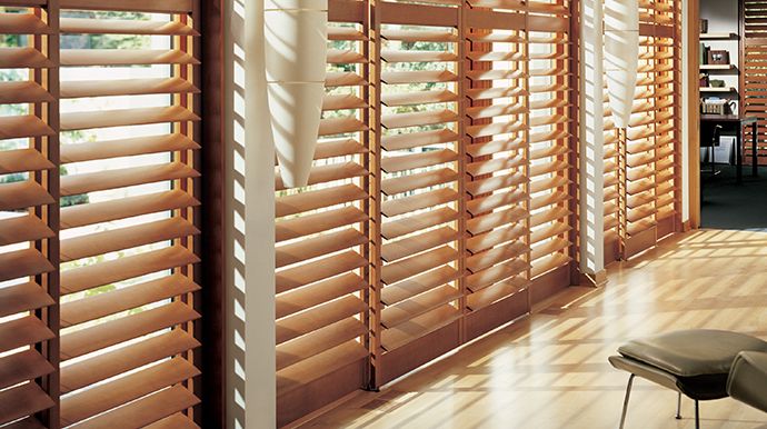Wood plantation shutters on large windows, window shutters in Kings Beach, CA.