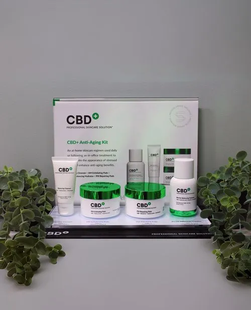 A display of cbd products on a shelf.