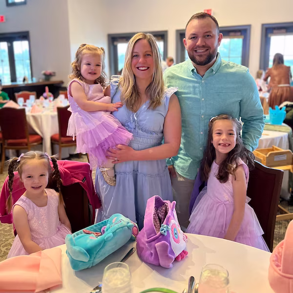 Robert Lopez with his wife and kids