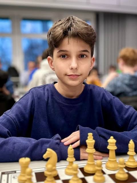 Antoni Radzimski at a tournament chessboard