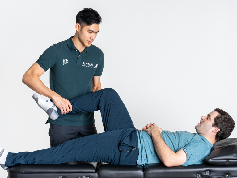  Patient receiving manual therapy treatment at a physical therapy clinic in Bellevue, WA
