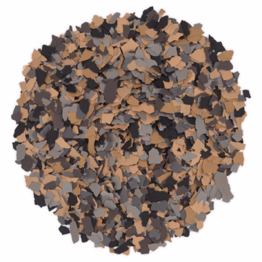 Top view of a circular pile of small, irregularly shaped flakes in shades of brown, gray, and black.