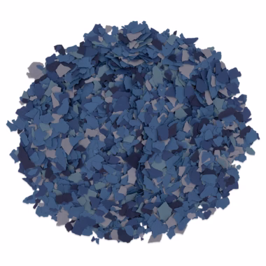 Pile of dark blue and navy small irregular flakes on white background.