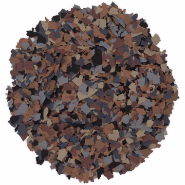 Pile of small, irregularly shaped flakes in various brown, black, and gray tones arranged in a circle.