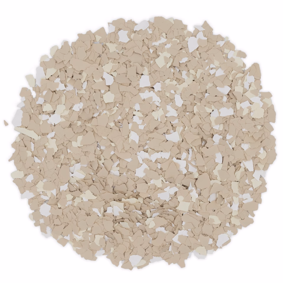 Pile of light brown, irregularly shaped flakes on a white background.