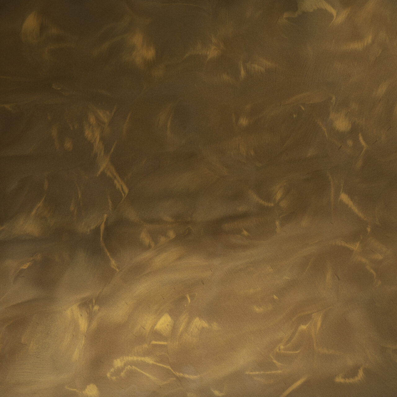 Pile of blue, black, white, and gray decorative floor flakes on a white background.