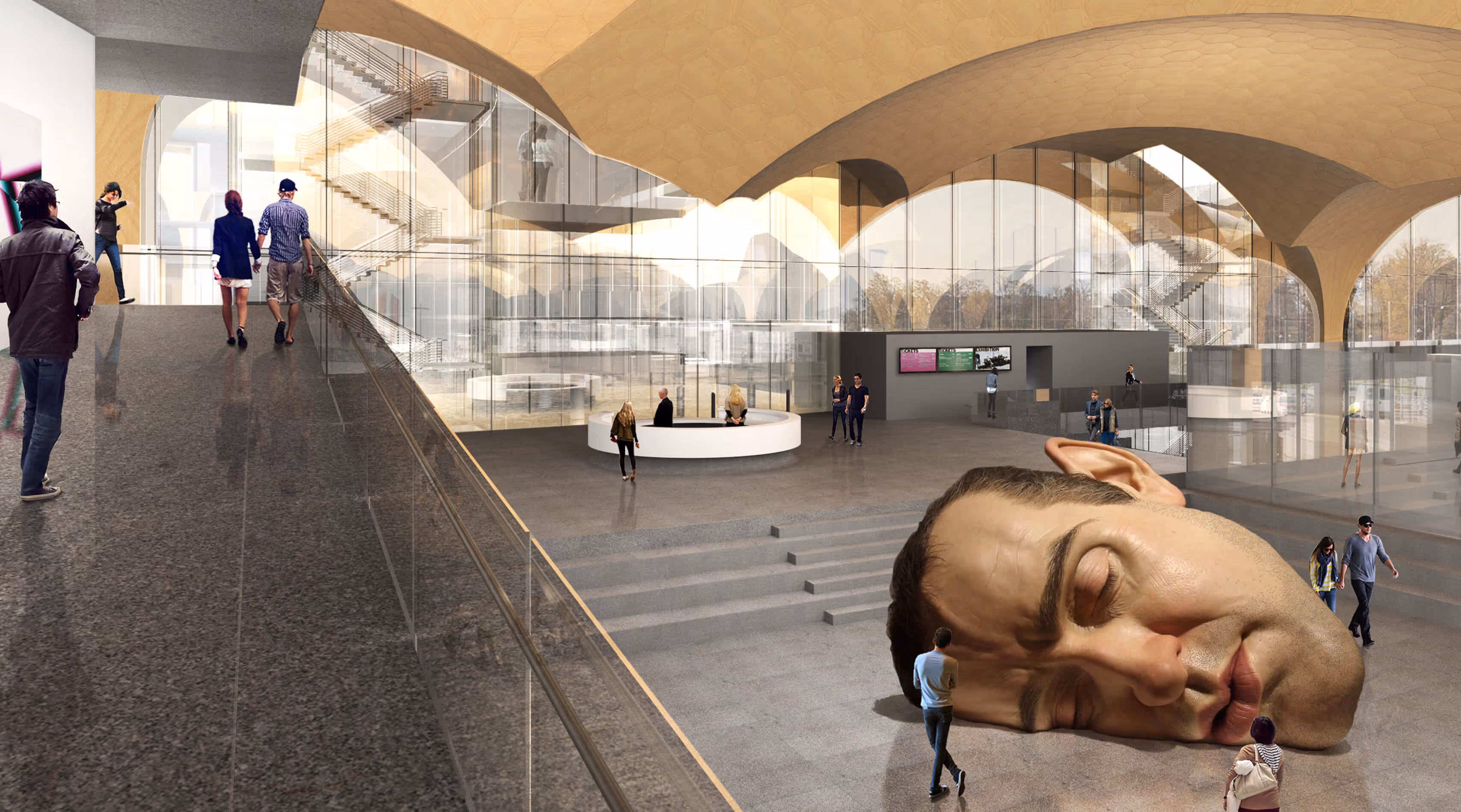 Modern museum interior with large glass walls, curved ceilings, people, and a giant sleeping man's head sculpture.