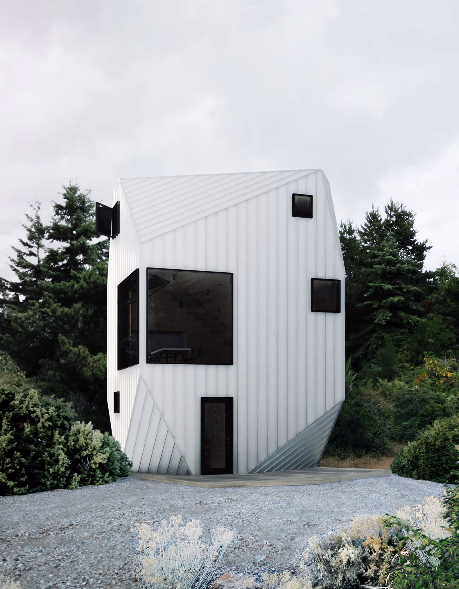 Modern white heptagon-shaped house with black-framed windows in a forested area.