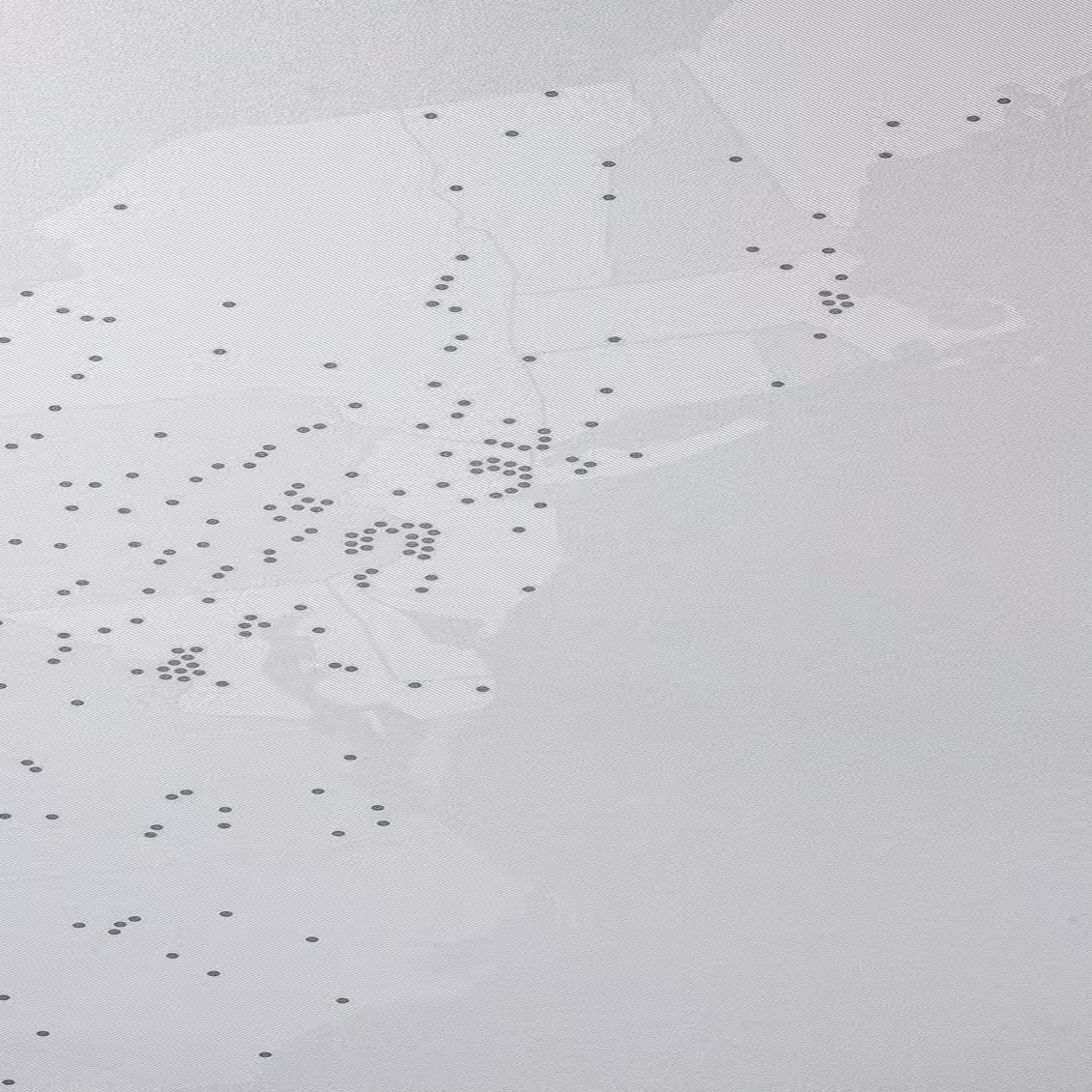 Map with evenly spaced gray dots marking locations across a light gray textured background.