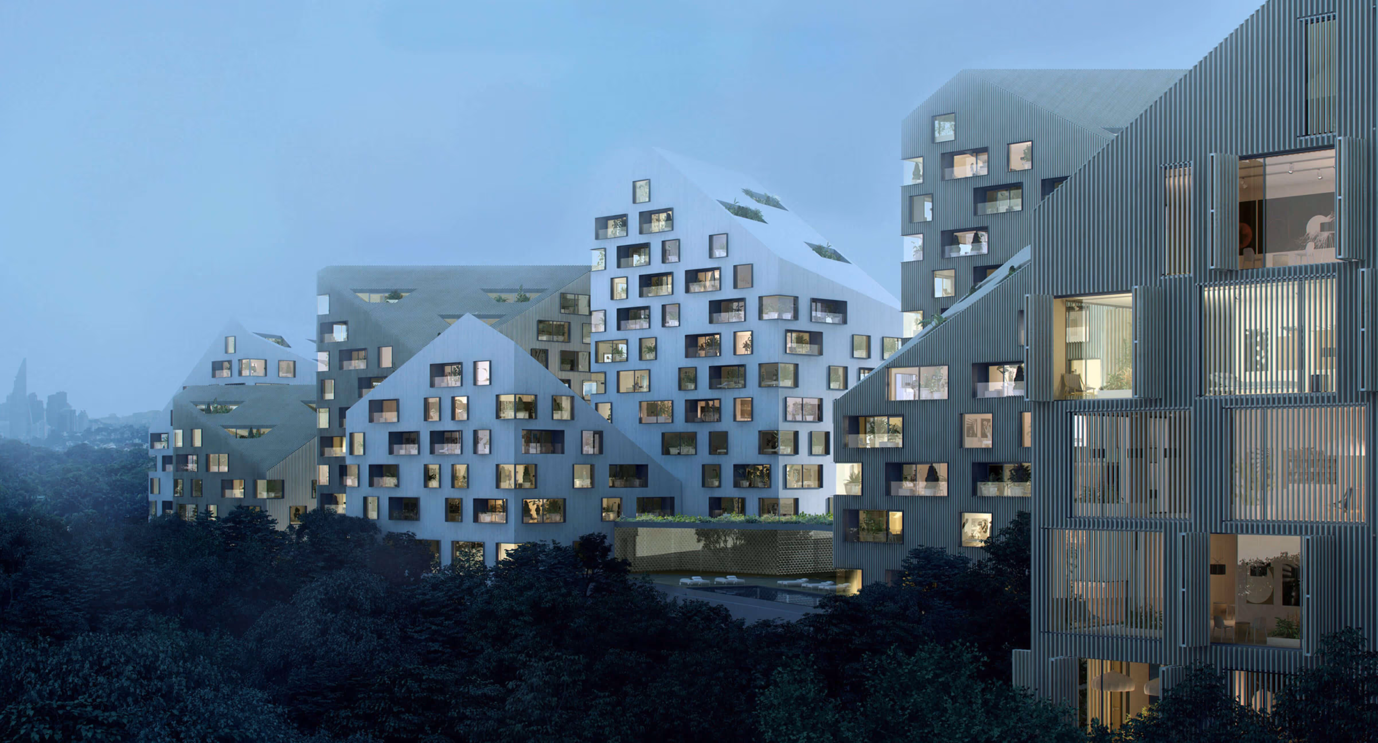 Modern residential buildings with slanted roofs and scattered windows surrounded by dense trees at dusk.