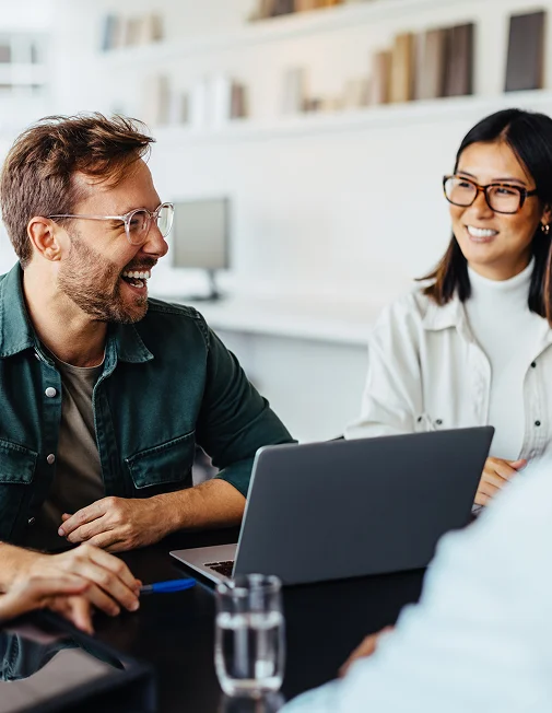 Man and woman at a laptop