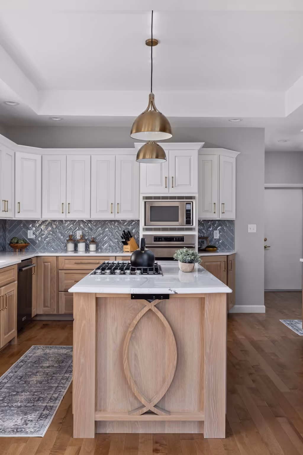 Kitchen island with wood base and white countertop
