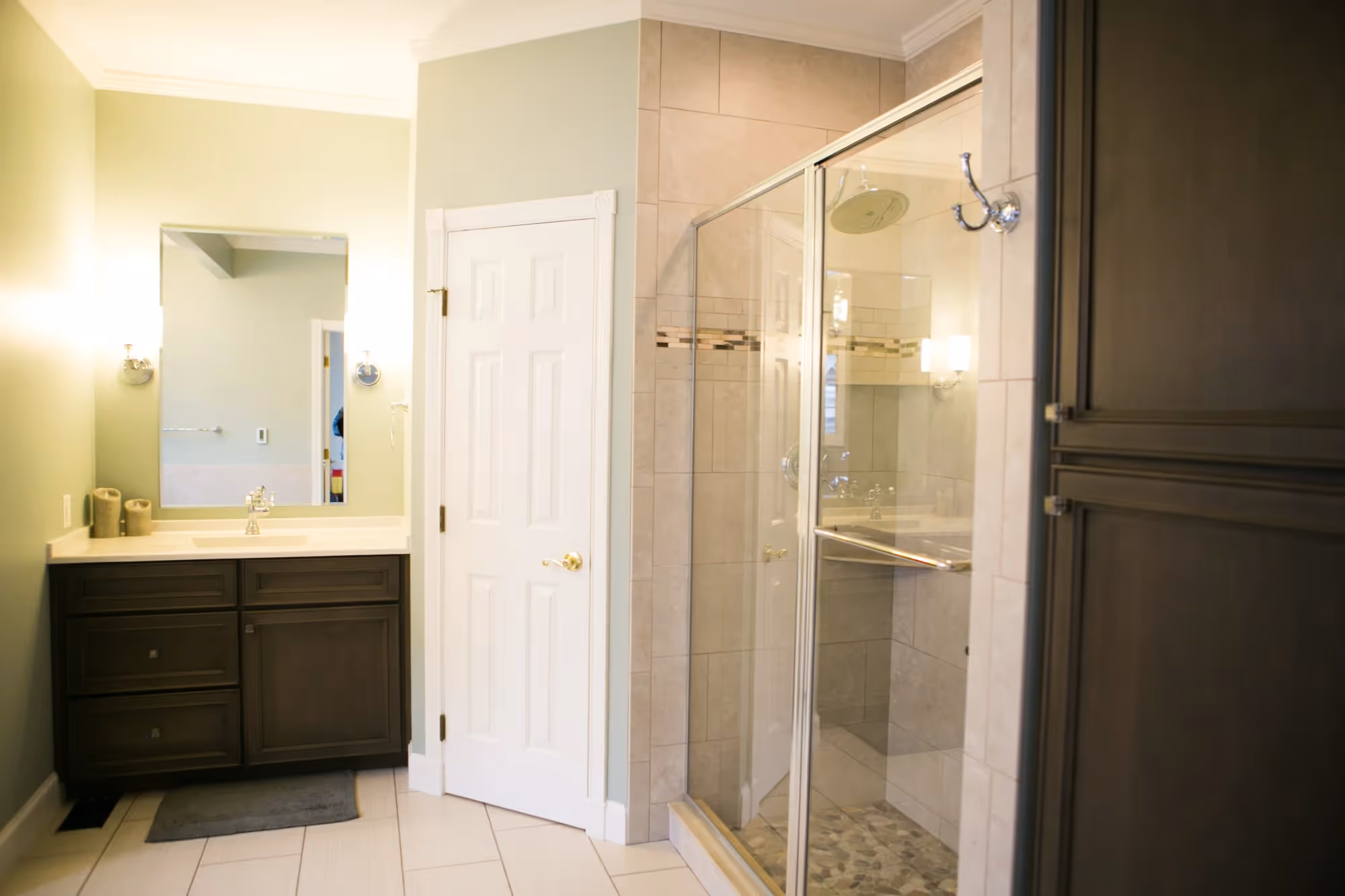 Modern bathroom with shower and vanity.